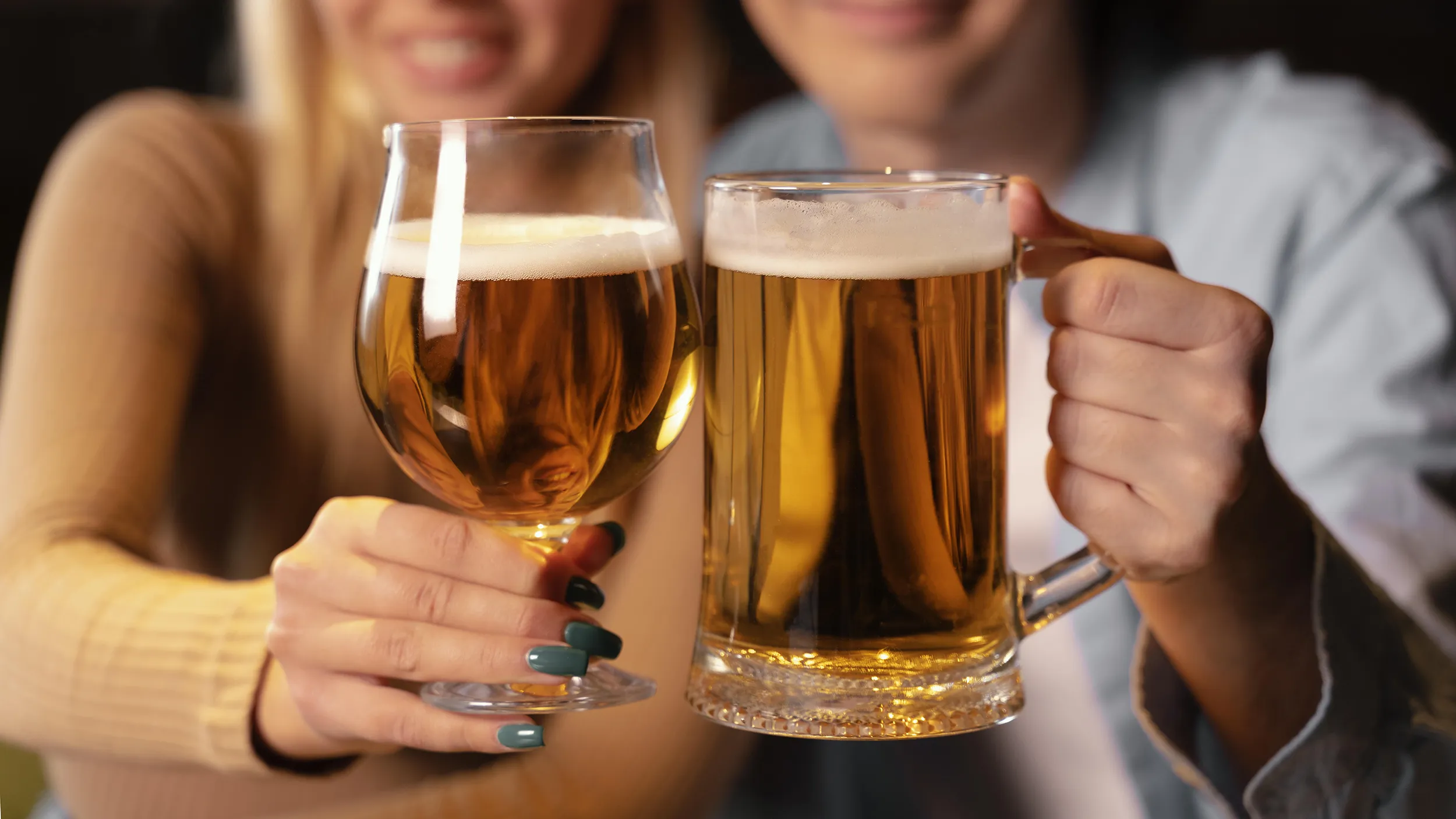 Two people toasting with Baltika